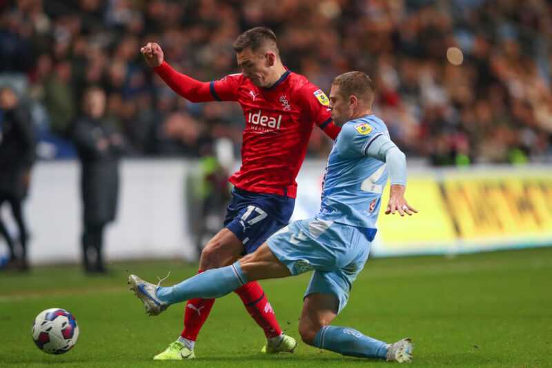 Sky Bet Championship Coventry City v West Bromwich Albion ake Bidwell #27 of Coventry City tackles Jed Wallace #17 of West Bromwich Albion during the Sky Bet Championship match Coventry City vs West Bromwich Albion at Coventry Building Society Arena, Coventry, United Kingdom, 21st December 2022 (Photo by Gareth Evans/News Images)