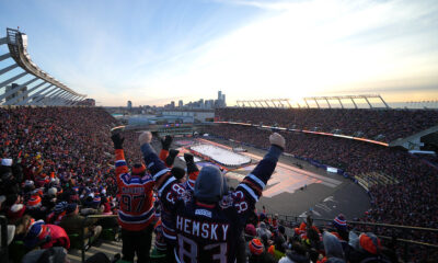Edmonton Oilers fans react after a goal scored by Zach Hyman #18 of the Edmonton Oilers during the first period of the 2023 Tim Hortons NHL Heritage Classic between the Calgary Flames and the Edmonton Oilers