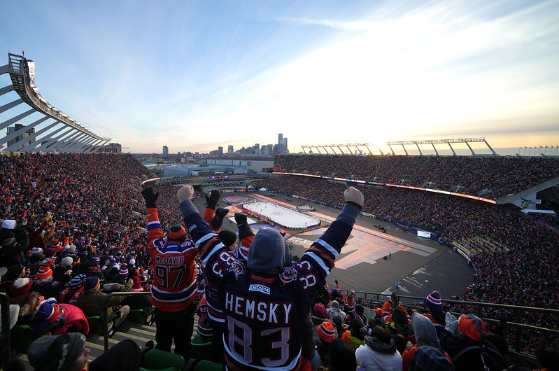 Edmonton Oilers fans react after a goal scored by Zach Hyman #18 of the Edmonton Oilers during the first period of the 2023 Tim Hortons NHL Heritage Classic between the Calgary Flames and the Edmonton Oilers